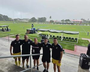 The officiating crew for the Highlanders-Moana Pasifika match in Tonga last weekend is (from left...