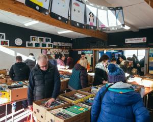 People look through the offerings at the St Joseph’s Primary School book fair in Queenstown...
