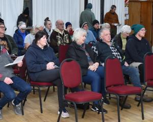 Members of the public gather at the meeting to oppose Port Otago plans to establish a new pop-up...