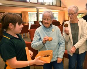 Green Island School pupil Ava Creasey, 11 offers Chatsford retirement village residents, from...