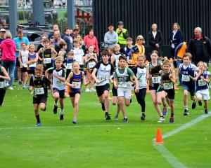 Children get into their stride at the start of the under-12 and under-14 mixed race during the...