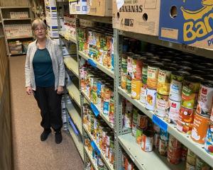 Presbyterian Support Otago Family Works foodbank co-ordinator Marilyn Donaldson stands amid the...