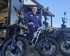 Waimate mechanic Robbie McKenzie shows off the UBCO electric motorbikes he is now selling. PHOTOS...