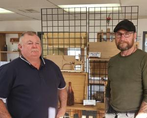 Jmac Joinery owner John ‘‘Spongy’’ McCarthy (left) and sculptor Steve Molloy show off some of the...