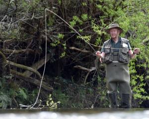 Mike Weddell practises casting on the Silver Stream ahead of the start of the fishing season...