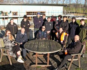 Big River Trades academy take a celebratory smoko pie-shout with (seated, from left) Kaelyn...