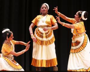Dancers perform the Indian classical dance form of Mohiniyattam. Photo: Getty Images
