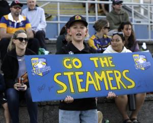 A young Bay of Plenty fan cheers for the Steamers during an NPC game in Tauranga. PHOTO: GETTY...