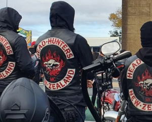 The law making it an offence to display gang insignia in a public place comes into effect on...