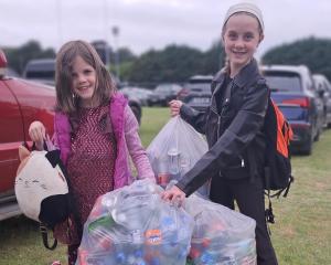 Kate Keegan (7) and Eleanor Keegan (12) taking part in Ireland’s deposit 
...