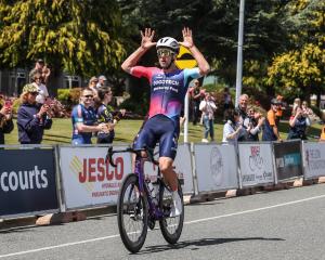 Southlander Tom Sexton celebrates yesterday’s stage win in the Tour of Southland with the antlers...
