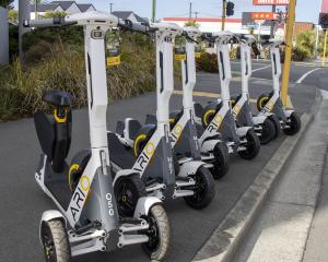 A line of Ario e-scooters on Lincoln Rd. Photo: Geoff Sloan