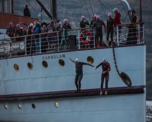 Jumping off the Earnslaw before the 4km swim from Frankton Arm to Queenstown Bay last year. PHOTO...