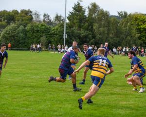 West Taieri front-rower Logan Moore on his way to the line for one of his two tries against Toko...
