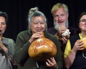 Practising on traditional Māori musical instruments are performers (from left) Ariana Tikao,...