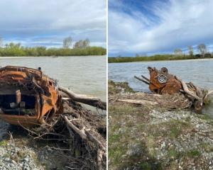 A car that had washed down the Mataura River had to be salvaged by Environment Southland. Photo:...