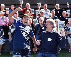 Maori Hill School kapa haka kaea (leader) Mackay Blaikie, 10, welcomes the class of 1958,...
