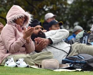 Ranjit Singh applauds the White Ferns and Sri Lankan cricket teams for their play during cold and...