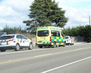 Emergency services attend the scene on Oamaru-Alma Rd, SH1, today. Photo: Nic Duff