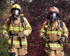 Kalem Blackley (left) and Jim Smith go for a walk in their gear in preparation for the Sky Tower...