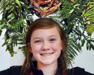Dunedin North Intermediate pupil Sylvie Wardell, 11, shows off a photo of an artwork she made...