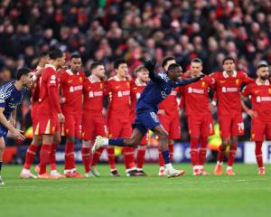 Ousmane Dembele of Paris Saint Germain celebrates as PSG win the penalty shoot out against...