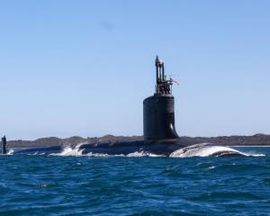 The USS Minnesota sails in the waters off the Western Australian coast. Photo: Getty