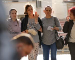 A victim of Pulse Club is being accompanied at Stip General Hospital on March 16, 2025 in Stip,...