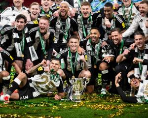 Newcastle United celebrate with the League Cup at Wembley. Photo: Getty Images