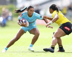 Winnie Palamo (left), of Matatū, attempts to evade Ayesha Leti-I’iga, of the Hurricanes Poua,...