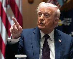 US President Donald Trump at a cabinet meeting yesterday. Photo: Getty Images