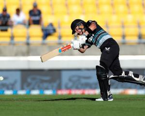 Amelia Kerr plays a shot for the White Ferns in this afternoon's loss to Australia. Photo: Getty...