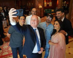 Prime Minister Christopher Luxon takes time for a selfie with Bollywood movie stars at a...