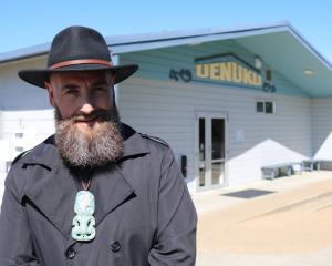 Ngāi Tahu kaiwhakahaere Justin Tipa outside wharenui Uenuku at Moeraki. PHOTO: JULES CHIN