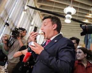 David Seymour samples one of his $3 school lunches. Photo: RNZ