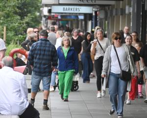 Pre-Christmas shoppers take to George St in December last year. Otago retail spending soared 9.1%...
