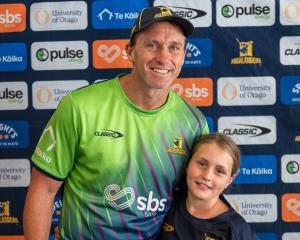 Highlanders assistant coach Ben Smith with daughter Annabelle yesterday. Photo: Highlanders