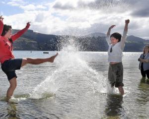Dunedin playwright Cindy Diver (right) keeps out of reach of actors Millie Manning (left), of...