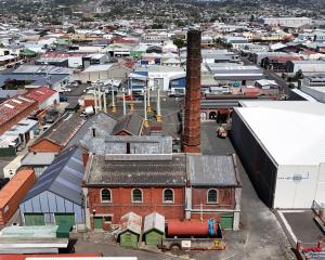 The chimney is part of the Dunedin Gasworks Museum and is directly beside the Andersons Bay...