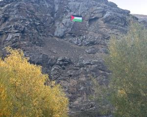 Motorists using the Cromwell Gorge road yesterday may have noticed a large Palestinian flag on...