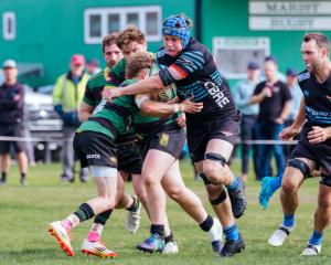 Pirates Old Boys lock Anton Schroder charges at the Marist defence during a Southland premier...