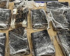 More than 75 packages of cocaine wrapped in cellophane were located in bags. Photo: Supplied / NZ...
