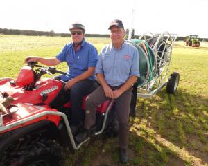 Harihari farmer and backyard engineer Jock Nolan, left, and Plucks Engineering managing director...