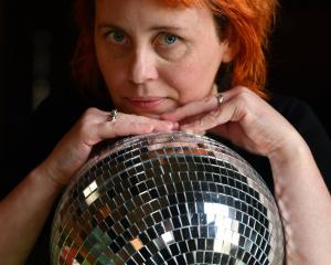 Jenny Duncan, of Pearl Diver, with a small disco ball after their larger one was taken. Photo:...