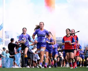 Matatū captain Alana Bremner leads her team out alongside the next generation. PHOTO: GETTY IMAGES