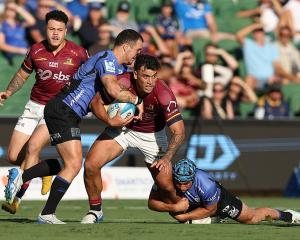 Thomas Umaga-Jensen of the Highlanders runs the ball during the round eight Super Rugby Pacific...