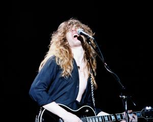 John Sykes of Thin Lizzy performs on stage, on the Thunder and Lightning tour at Hammersmith...