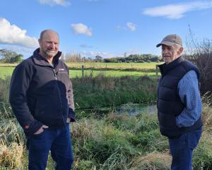 Geoff Spark (left) and his uncle Richard Spark next to North Brook Stream. The proposed North...