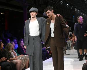 iD International Emerging Designer winner Ciaran Naylor (right) poses with a model during last...