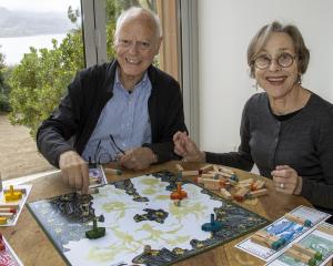 Simon and Belinda Mortlock in the middle of a game of Red Herring. Photo: Geoff Sloan ​